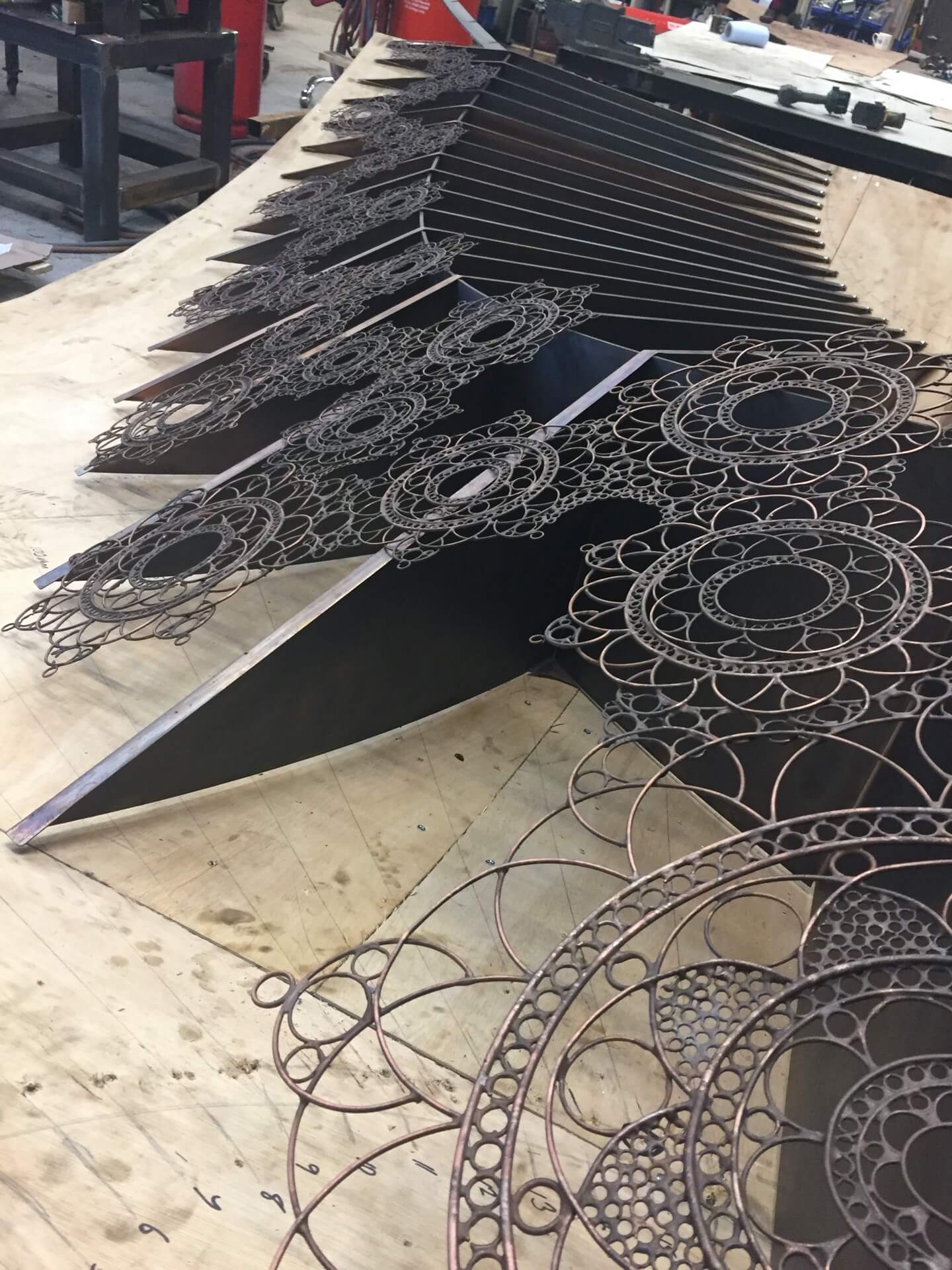 Sculpture in metal of lace fans by Yasemen Hussein at Clarges, London